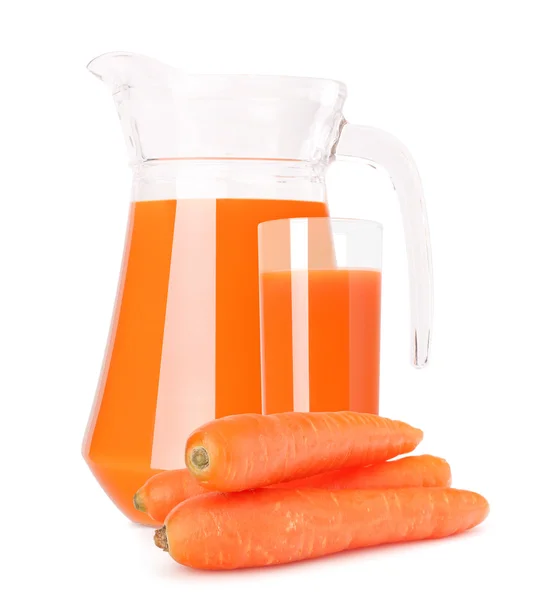 Carrot vegetable juice in glass jug — Stockfoto