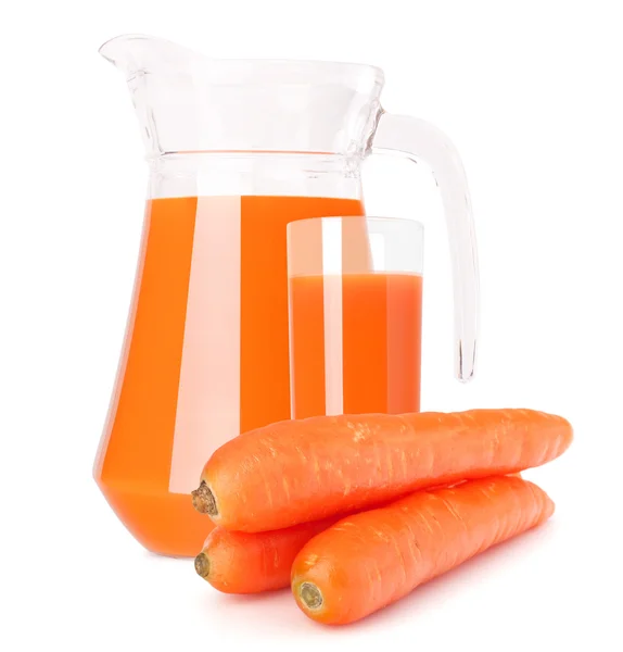 Carrot vegetable juice in glass jug — Stockfoto
