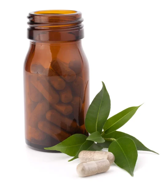 A növényi drog kapszula barna üvegben. Alternatív gyógyászat — Stock Fotó