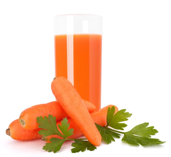 Vidro de suco de cenoura e tubérculos de cenoura — Fotografia de Stock