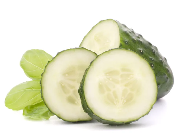 Sliced cucumber vegetable and basil leaves still life — Stock Photo, Image