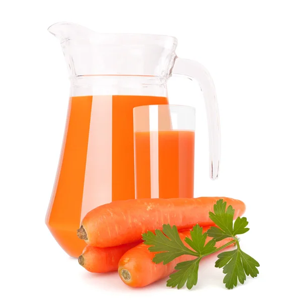 Carrot vegetable juice in glass jug — Stock Photo, Image