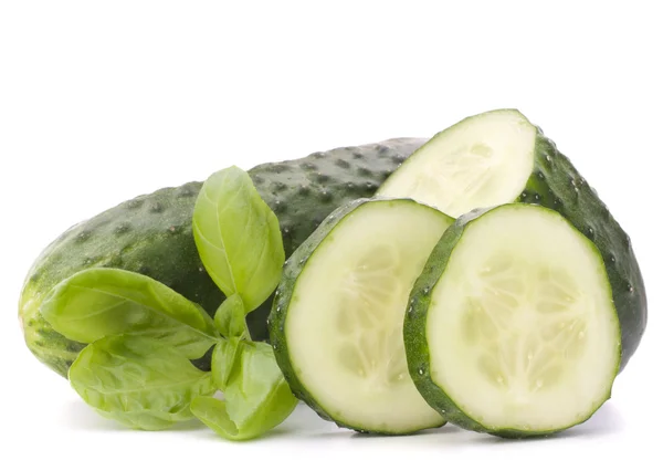 Sliced cucumber vegetable and basil leaves still life — Stock Photo, Image