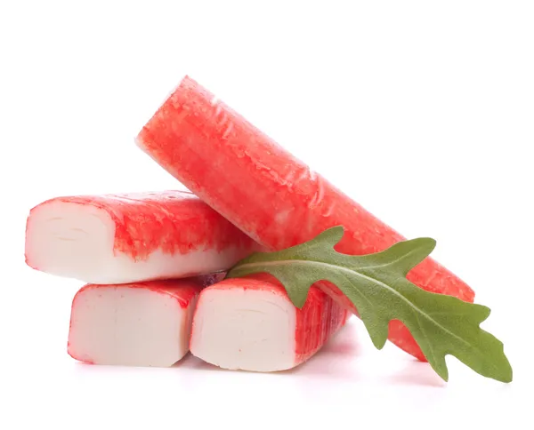 Crab sticks group and rucola leaf — Stock Image Crab sticks group and rucola leaf Stock Photo