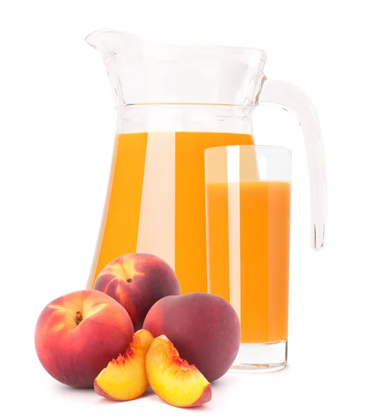 Suco de fruta pêssego em jarro de vidro — Fotografia de Stock