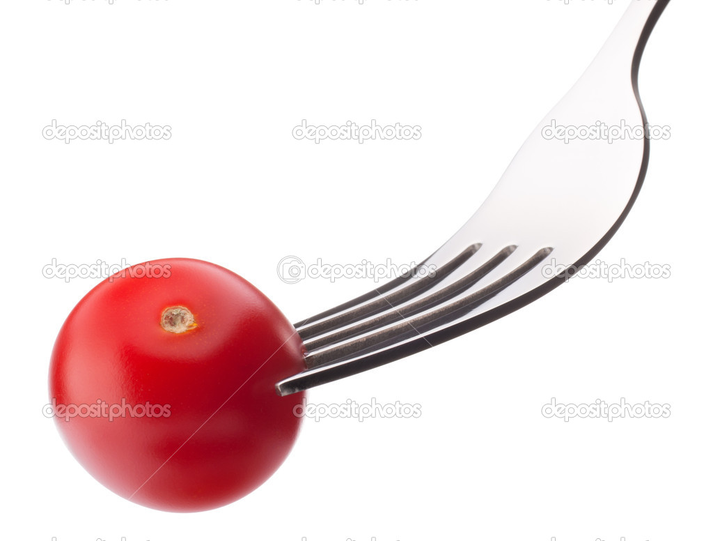 Cherry tomato on fork isolated on white background cutout. Healt