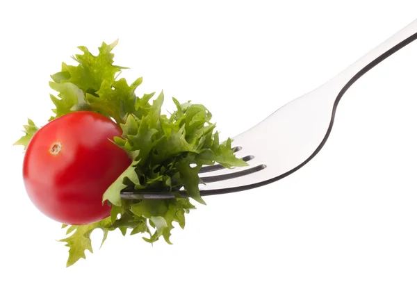 Fresh salad and cherry tomato on fork isolated on white backgrou — Stock Photo, Image