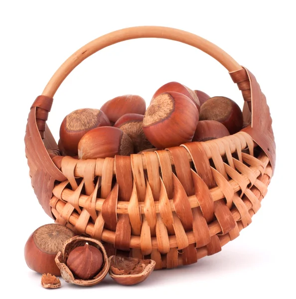 Hazelnuts in wicker basket — Stock Photo, Image