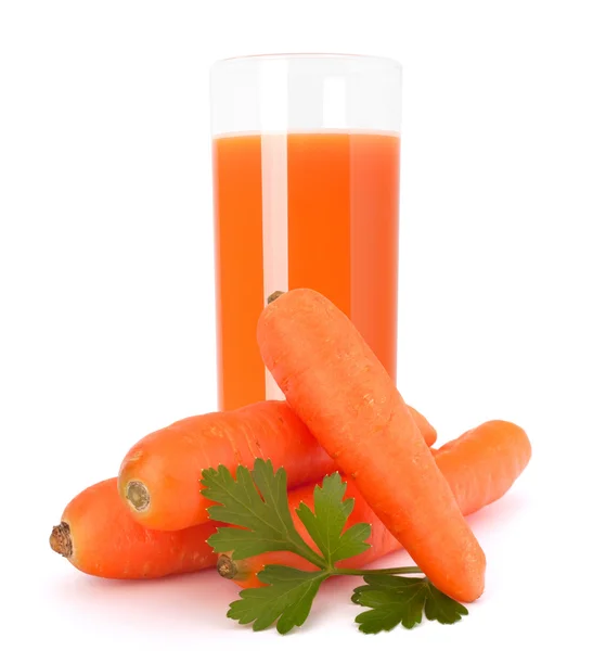 Carrot juice glass and carrot tubers — Stock Photo, Image