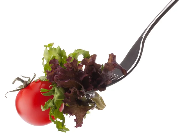 Ensalada fresca y tomate cherry en tenedor —  Fotos de Stock