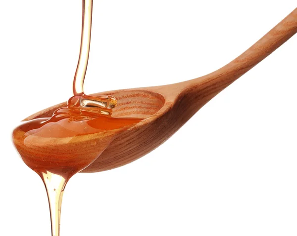 Honey dripping — Stock Photo, Image
