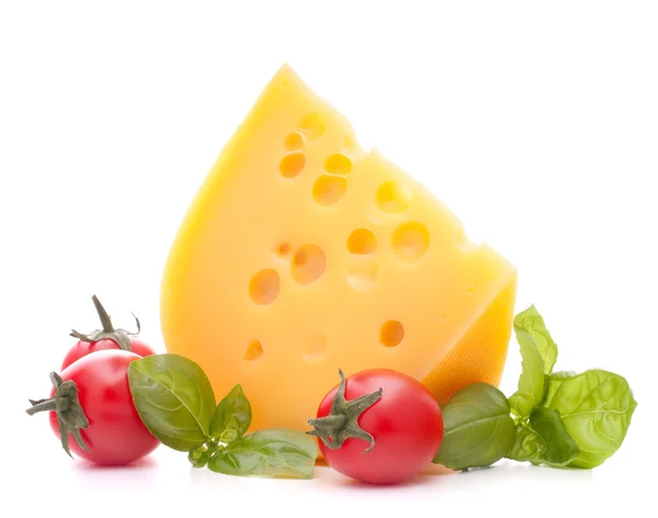 Cheese and basil leaves still life — Stock Photo, Image