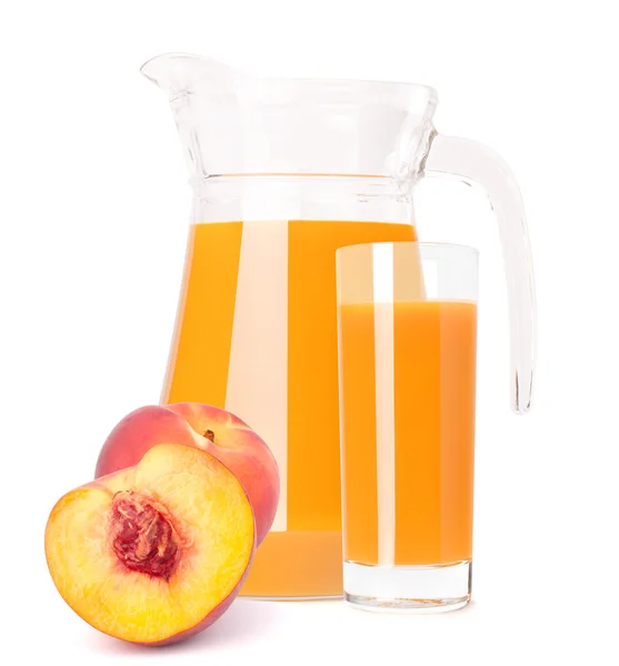 Peach fruit juice in glass jug — Stock Photo, Image