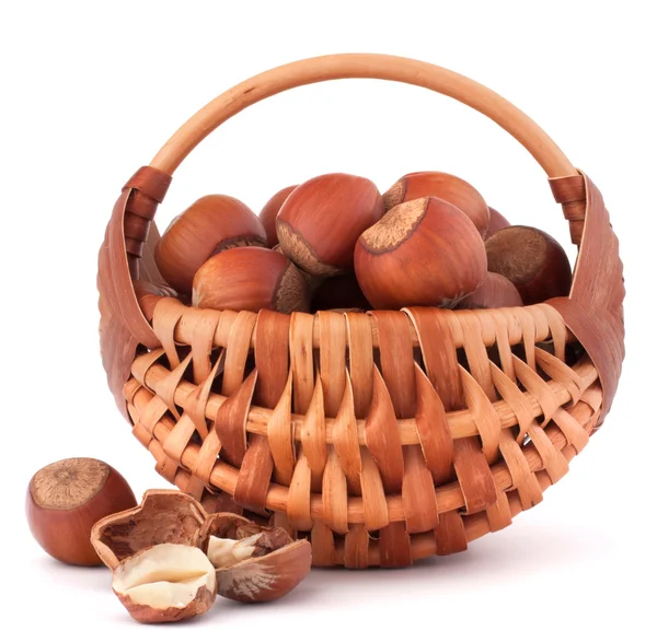 Hazelnuts in wicker basket — Stock Photo, Image