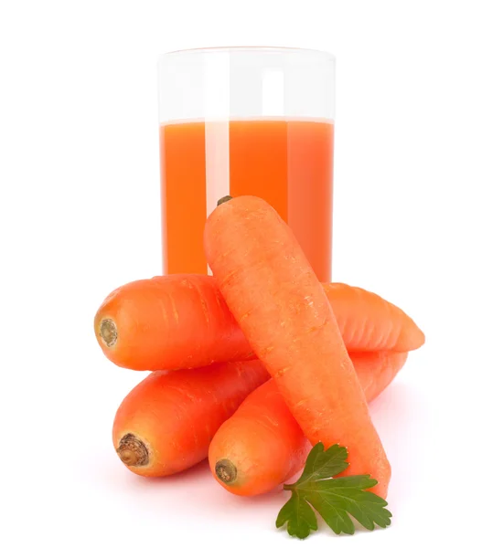 Bicchiere di succo di carota e tuberi di carota — Foto Stock