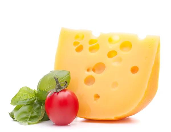 Cheese and basil leaves — Stock Photo, Image