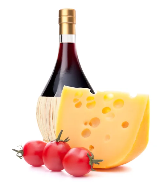 Red wine bottle, cheese and tomato still life — Stock Photo, Image