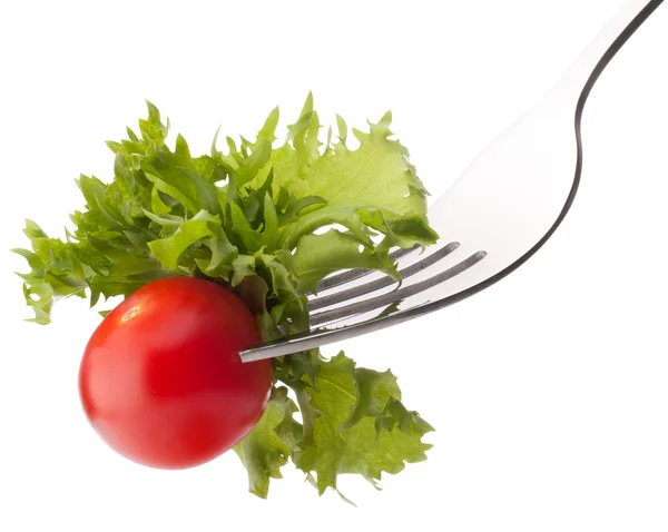 Salada fresca e tomate cereja em garfo — Fotografia de Stock