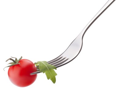 taze rucola salata ve çatal üzerinde kiraz domates