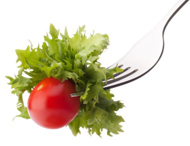 taze salata ve çatal üzerinde kiraz domates