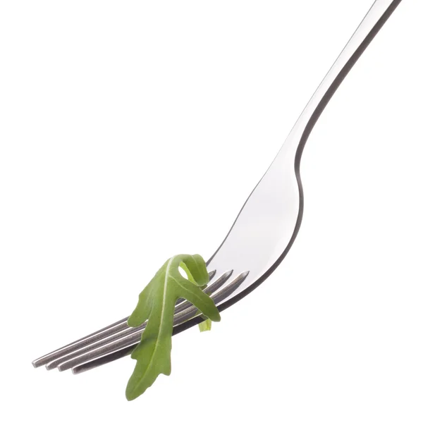 Fresh rucola salad on fork isolated on white background cutout. — Stock Photo, Image