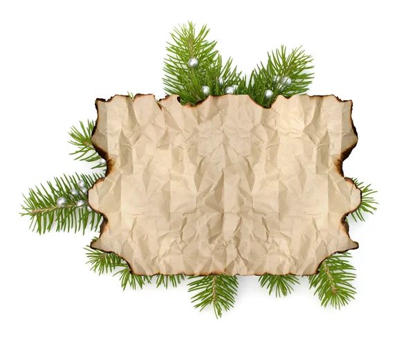 Oude Perkamentpapier met kopie ruimte op christmas tree branch achtergrond geïsoleerd — Stockfoto