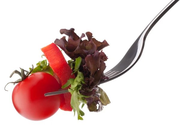 Fresh salad and cherry tomato on fork — Stock Photo, Image