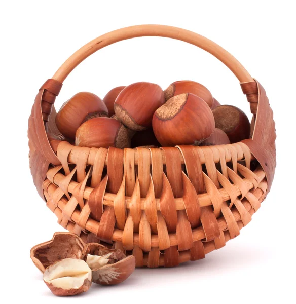 Hazelnuts in wicker basket — Stock Photo, Image