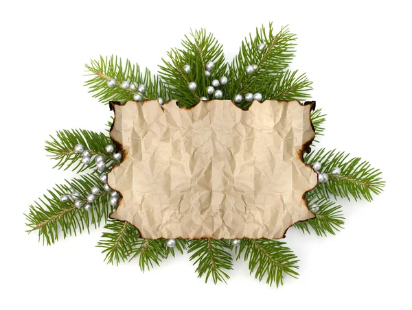 Papel de pergaminho velho com espaço de cópia no galho da árvore de Natal — Fotografia de Stock