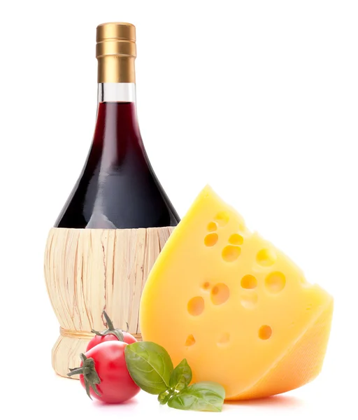 Red wine bottle, cheese and tomato still life — Stock Photo, Image