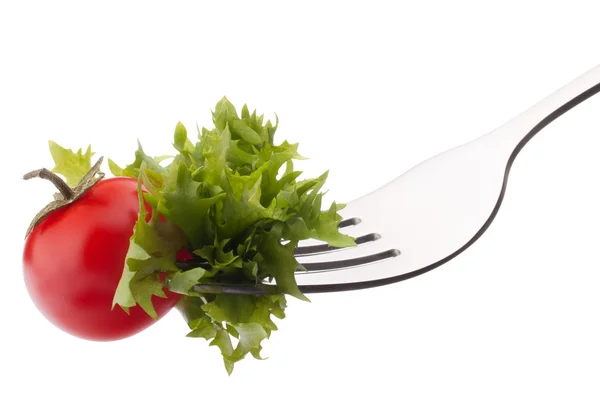 Fresh salad and cherry tomato on fork — Stock Photo, Image