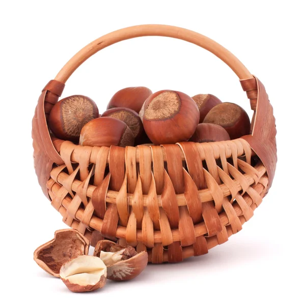 Hazelnuts in wicker basket — Stock Photo, Image