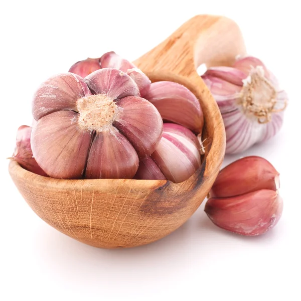 Garlic cloves in wooden bowl — Stock Photo, Image