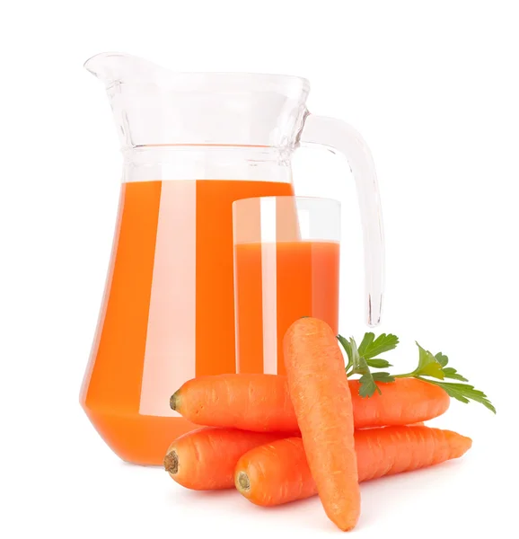 Carrot vegetable juice in glass jug — Stock Photo, Image