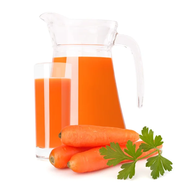 Carrot vegetable juice in glass jug — Stock Photo, Image