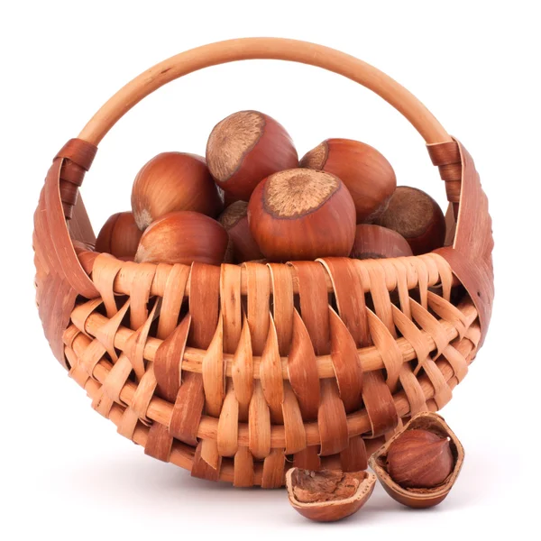 Hazelnuts in wicker basket — Stock Photo, Image