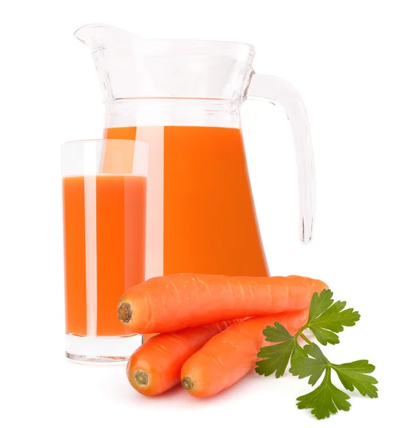 Carrot vegetable juice in glass jug — Stock Photo, Image