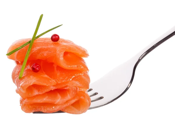 Pieza de salmón en tenedor — Foto de Stock