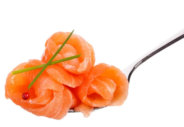 Salmon piece on fork — Stock Photo, Image
