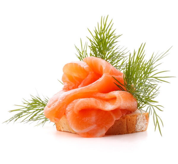 sandwich or canape with salmon on white background  cutout 