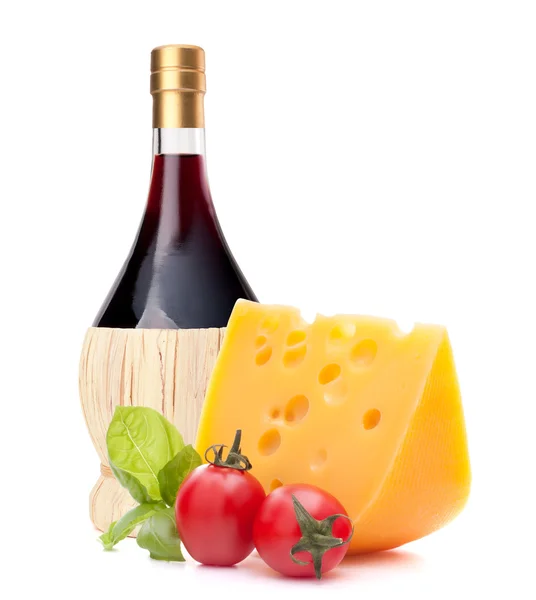 Red wine bottle, cheese and tomato still life — Stock Photo, Image