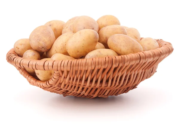 Potato tubers in wicker basket — Stock Photo, Image