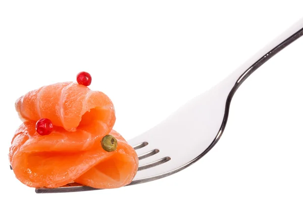 Salmon piece on fork isolated on white background cutout — Stock Photo, Image