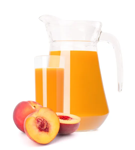 Persika fruktjuice i Glaskanna — Stockfoto
