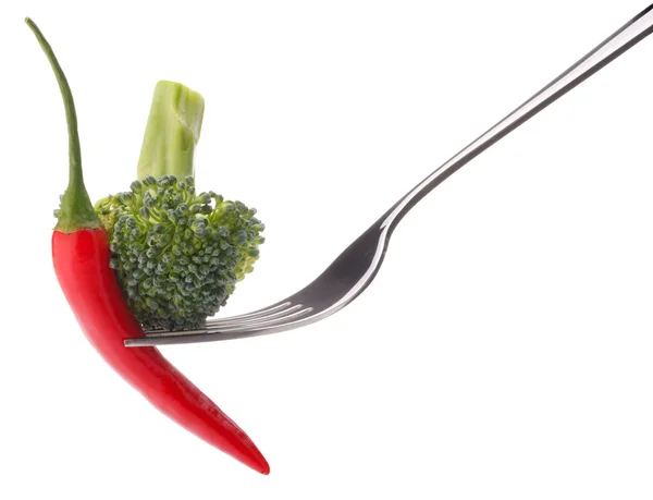 Fresh raw vegetables on fork — Stock Photo, Image