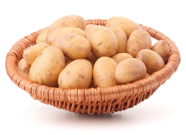 Potato tuber in wicker basket — Stock Photo, Image