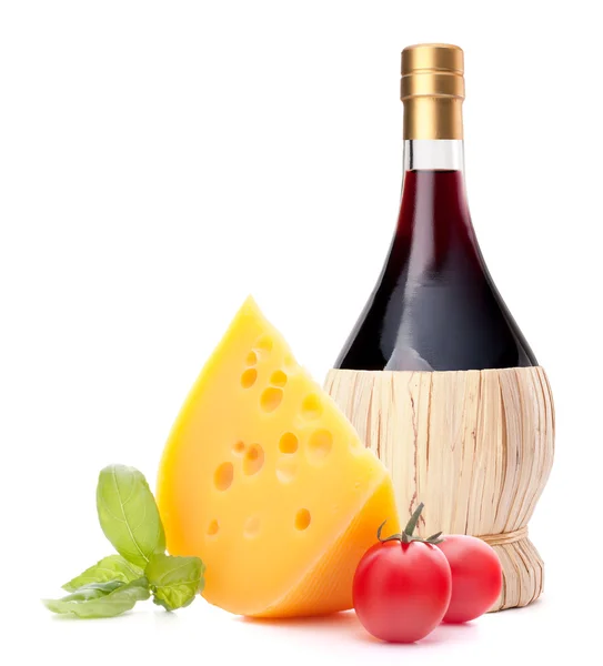 Red wine bottle, cheese and tomato — Stock Photo, Image