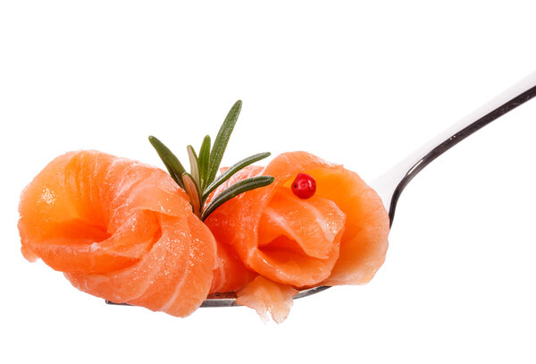 Salmon piece on fork