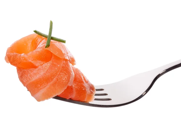 Salmon piece on fork — Stock Photo, Image