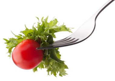 taze salata ve çatal üzerinde kiraz domates